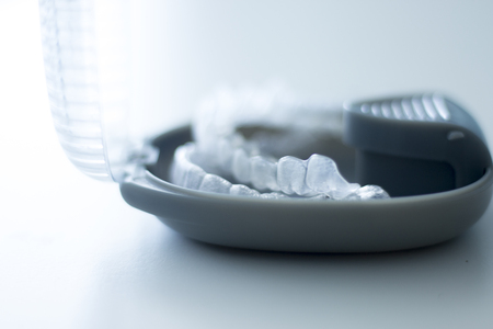 Invisible dental bracket aligners for modern orthodontic treatment to straighten teeth and improve...