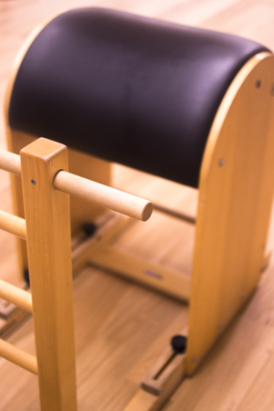 Pilates exercise training and flexibility stretching machine in gym yoga and wellbeing studio.の写真素材