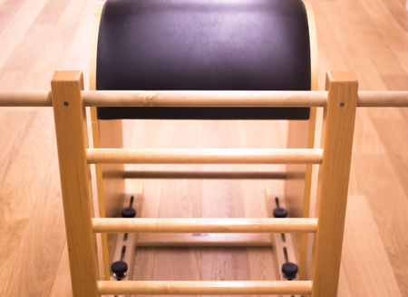 Pilates exercise training and flexibility stretching machine in gym yoga and wellbeing studio.