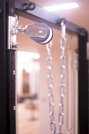 Pilates exercise training and flexibility stretching machine in gym yoga and wellbeing studio.