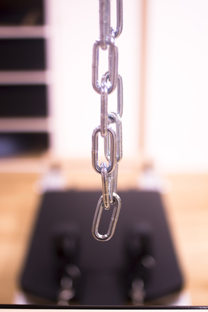 Pilates exercise training and flexibility stretching machine in gym yoga and wellbeing studio.
