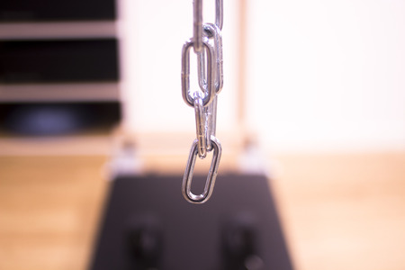 Pilates exercise training and flexibility stretching machine in gym yoga and wellbeing studio.の写真素材