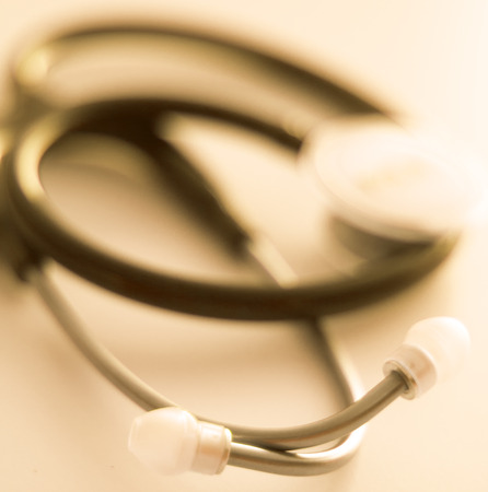 Doctors medical stethoscope heart rate monitoring equipment to listen to heartbeats of patient,の写真素材