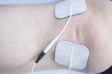 Physical therapy mecical clinic physiotherapy electrical impulse shock treatment for leg injury...