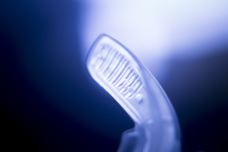 Dental braces aligners accelerator for both modern invisible and metal brackets to straighten and align teeth.の写真素材