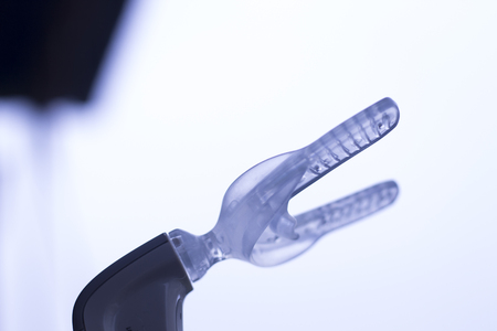 Teeth invisible brackets orthodontic dental tooth vibrator to accelerate orthodontics alignment straightening dentist treatment.の写真素材