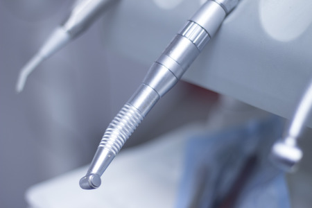 Dentists modern dental drill equipment in dentist's chair in dental surgery hospital.の写真素材