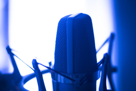 Studio vocal large diaphragm condenser voiceover recording microphone with built in antipop screen.の写真素材