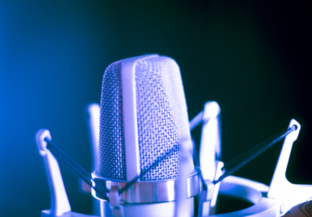 Studio vocal large diaphragm condenser voiceover recording microphone with built in antipop screen.の写真素材