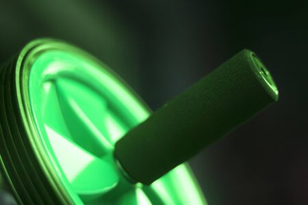 Ab roller fitness equipment to train addominal muscles for flat stomach and core training.の写真素材