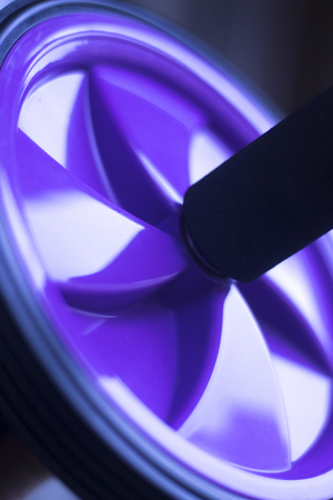 Ab roller fitness equipment to train addominal muscles for flat stomach and core training.の写真素材