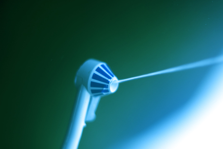 Dental water spray cleaner for interdental hygiene.の写真素材
