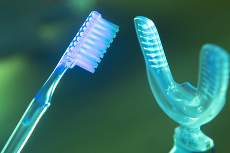 Dental bracket aligner accelerator vibrator for orthodontic straighteners, brackets and aligners.の写真素材