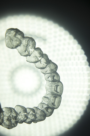 Invisible teeth retainers orthodontic brackets. Plastic modern straighterners to correct tooth...