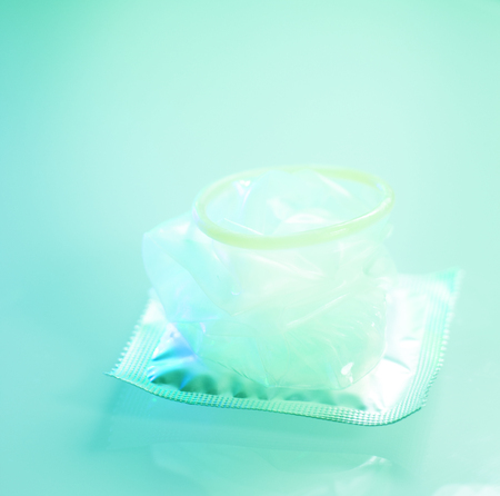 Rubber latex condom male contraceptive for safe disease and pregnancy free sex.の写真素材