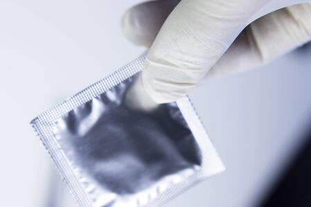 Rubber latex condom male contraceptive for safe disease and pregnancy free sex.の写真素材
