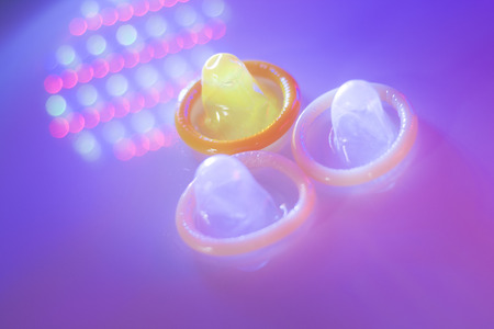 Rubber latex condom male contraceptive for safe disease and pregnancy free sex.の写真素材