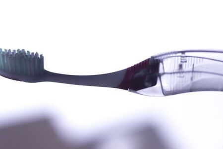 Manual modern tooth brush closeup on plain background.の写真素材