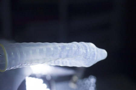 Rubber latex condom male contraceptive for safe disease and pregnancy free sex.