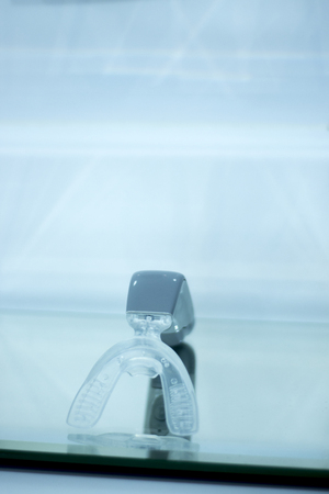 Dental bracket aligner accelerator vibrator for orthodontic straighteners, brackets and aligners.の写真素材