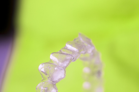 Invisible dental aligners plastic straighteners orthodontic brackets to align and straighten teeth.