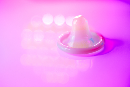 Rubber latex condom male contraceptive for safe disease and pregnancy free sex.の写真素材