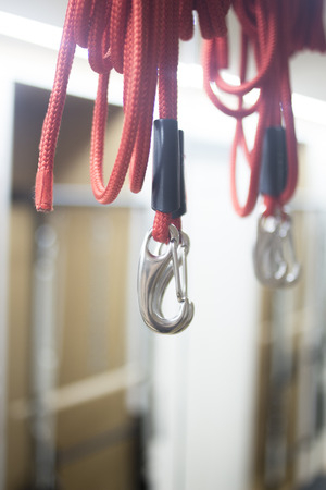 Pilates machine suspended handle in gym training fitness health studio suspension equipment.の写真素材