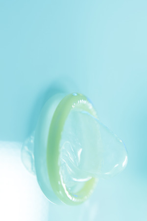 Rubber latex condom male contraceptive for safe disease and pregnancy free sex.の写真素材