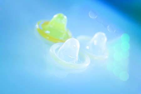 Rubber latex condom male contraceptive for safe disease and pregnancy free sex.の写真素材