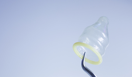 Rubber latex condom male contraceptive for safe disease and pregnancy free sex.の写真素材