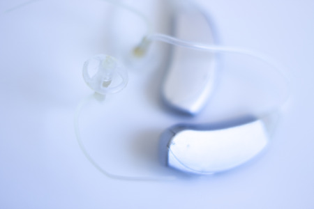 Modern digital in the ear hearing aid for deafness and the hard of hearing patients.の写真素材