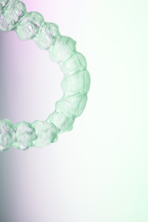 Invisible teeth dental tooth retainer aligner to straighten each tooth in orthodontics treatment for patients.の写真素材