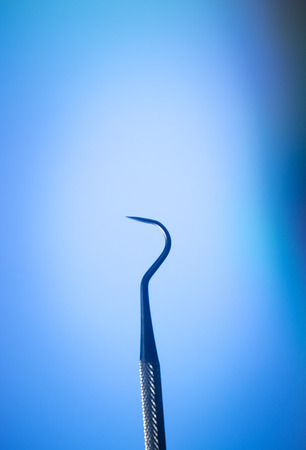 Dentist's dental toothpick tool instrumentation equipment to clean teeth and plaque.の写真素材