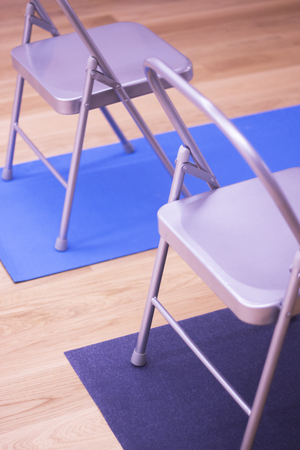 Yoga pilates and body & mind studio gym fitness room and chauir prop for group classes.の写真素材