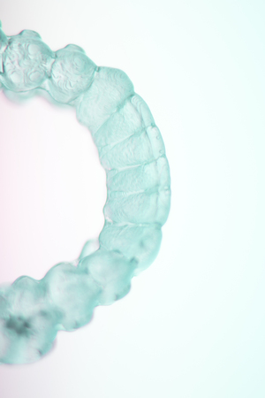 Invisible teeth dental tooth retainer aligner to straighten each tooth in orthodontics treatment for patients.の写真素材