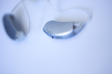 Modern digital in the ear hearing aid for deafness and the hard of hearing patients.の写真素材
