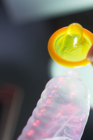 Rubber latex condom male contraceptive for safe disease and pregnancy free sex.の写真素材