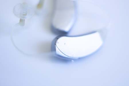 Modern digital in the ear hearing aid for deafness and the hard of hearing patients.の写真素材