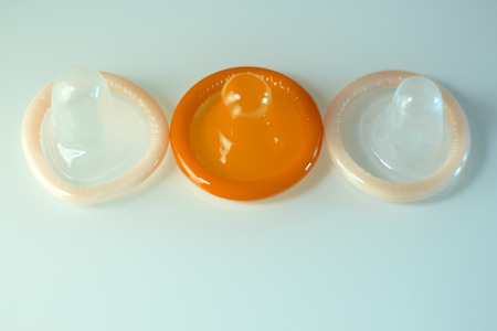 Rubber latex condom male contraceptive for safe disease and pregnancy free sex.の写真素材