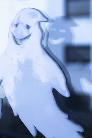 Halloween chidren's party toy ghost levitating flying in the air.の写真素材
