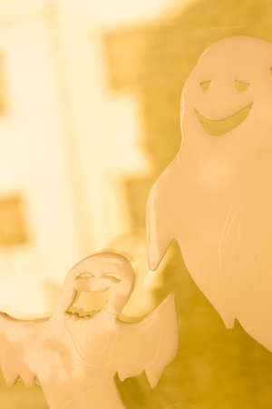 Halloween chidren's party toy ghost levitating flying in the air.の写真素材