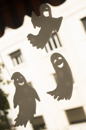 Halloween chidren's party toy ghost levitating flying in the air.の写真素材