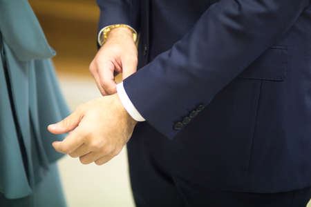 Young bride and groom in  formal weddings business suit and casual dress in civil wedding marriage ceremony.の写真素材