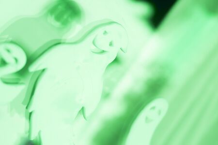 Halloween chidren's party toy ghost levitating flying in the air.の写真素材