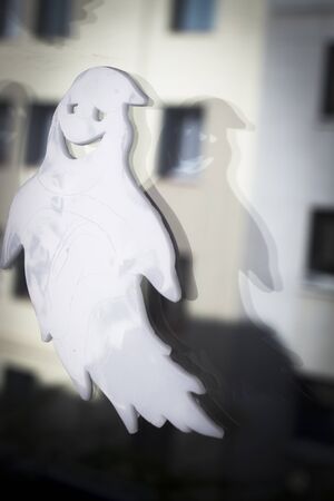 Halloween chidren's party toy ghost levitating flying in the air.の写真素材