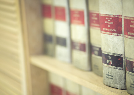 Law firm offices old legal report books on bookshelf. The book models are old and generic and do not require property release.の写真素材