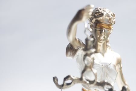 Bronze law firm legal statue of Themis in attorneys company office.の写真素材