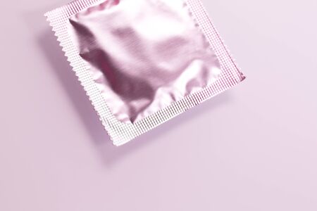Rubber latex condom male contraceptive for safe disease and pregnancy free sex.の写真素材