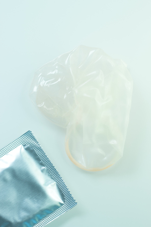 Rubber latex condom male contraceptive for safe disease and pregnancy free sex.の写真素材
