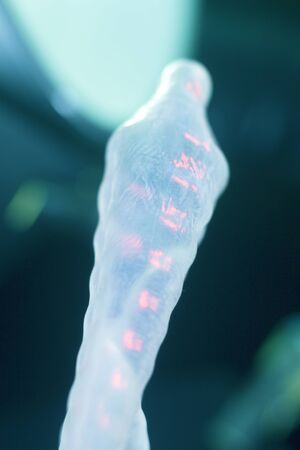 Rubber latex condom male contraceptive for safe disease and pregnancy free sex.の写真素材